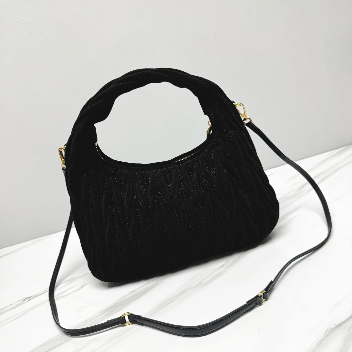 Tas MI 556 Matelassé Suede Zwart