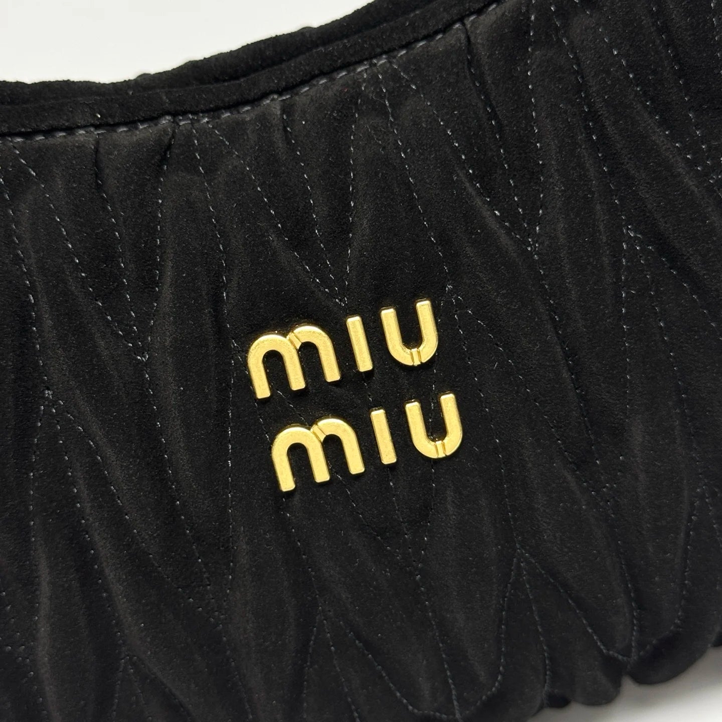 Tas MI 556 Matelassé Suede Zwart